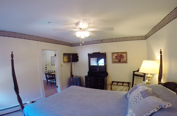 Bedroom of Black River suite at echo lake inn