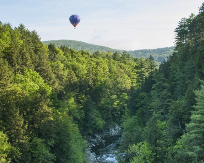 Balloon soaring over the Quechee Gorge in Vermont during the Quechee Balloon Festival