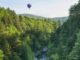 Balloon soaring over the Quechee Gorge in Vermont during the Quechee Balloon Festival